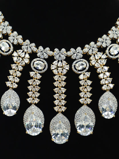 Elegant White American Diamond Necklace with White And Gold Highlights and Paired Earrings